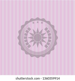 sun icon inside realistic pink emblem