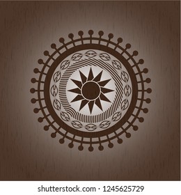 sun icon inside retro style wooden emblem