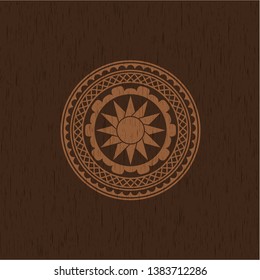 sun icon inside retro style wood emblem