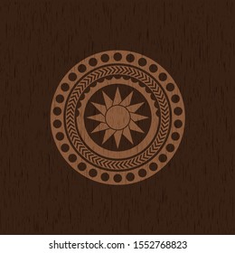 sun icon inside retro wood emblem
