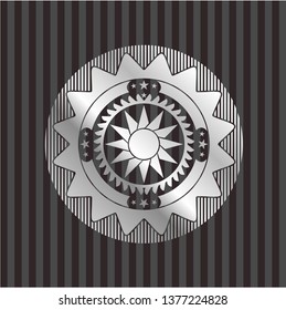 sun icon inside silver badge or emblem