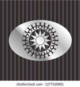 sun icon inside silver emblem or badge