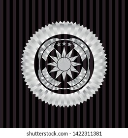 sun icon inside silver emblem