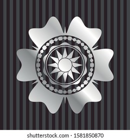 sun icon inside silver shiny emblem