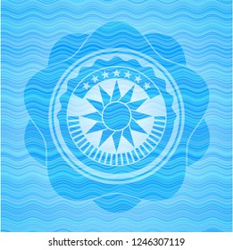 sun icon inside sky blue water emblem.