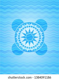 sun icon inside sky blue water style emblem.