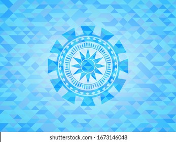 sun icon inside sky blue emblem with triangle mosaic background