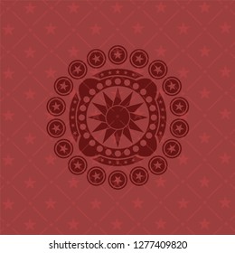 sun icon inside vintage red emblem