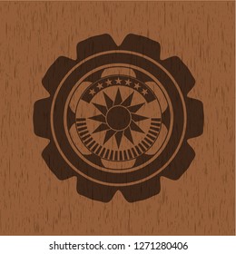 sun icon inside vintage wooden emblem