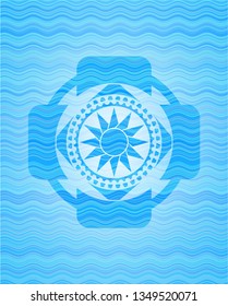 sun icon inside water concept badge background.