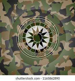 sun icon on camouflaged texture
