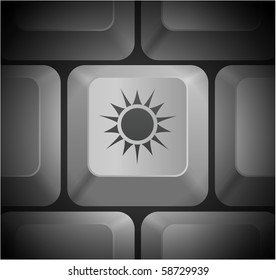 Sun Icon on Computer Keyboard Original Illustration
