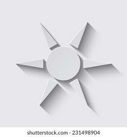 sun icon with shadow on a grey background