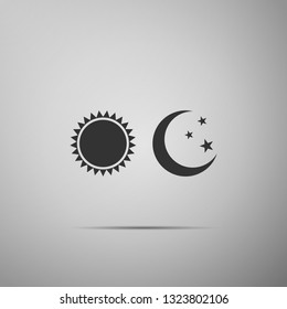 Sun and moon icon isolated on grey background. Weather daytime and night. Flat design. Vector Illustration