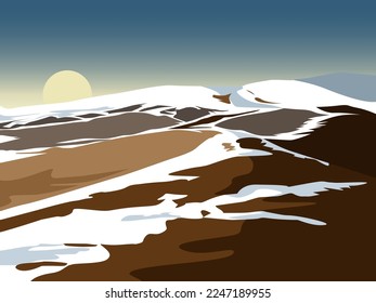 The sun over the snow-capped mountains in the steppe