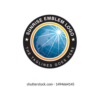 sun rays rise on ground globe earth inside circular round emblem
