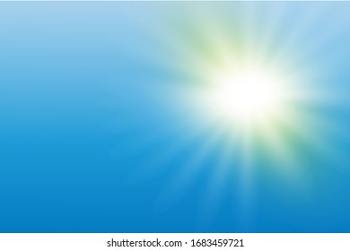 
the sun shines brightly with hot rays in the blue sky