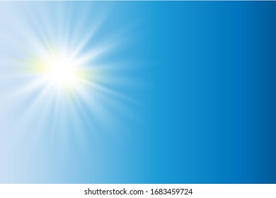 
the sun shines brightly with hot rays in the blue sky