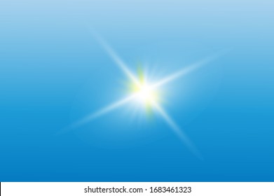 
the sun shines brightly with hot rays in the blue sky