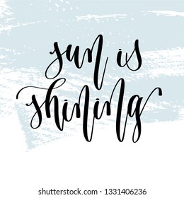sun is shining - hand lettering typography poster about summer time positive quote on blue brush stroke background, vector illustration
