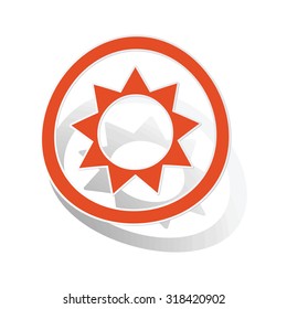 Sun sign sticker, orange circle with image inside, on white background