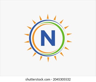 Sun Solar Energy Logo On Letter N Template. N Letter Solar Logo Design. Solar Panel Farm Electric Farming Industry Logo Template 