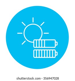 Sun with two batteries line icon for web, mobile and infographics. Vector white icon on the light blue circle isolated on white background.