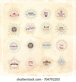 Sunburst  logo set, emblems and icons on an old paper  background. 