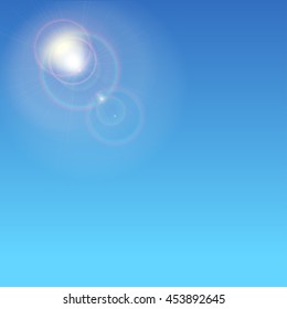 Sunburst with sun flare. Abstract glowing ring from the sun. Glare and rays on a blue background with glow halo