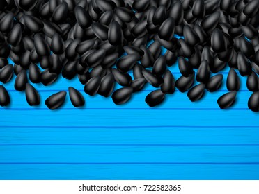 Sunflower seeds background with heap of scattered black grains