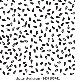 Sunflower seeds seamless pattern isolated on white.  Black and white colors. Summer seamless pattern with mess from sunflower seeds. Summer harvest. Design for textile, fabric,  packaging, wallpaper.
