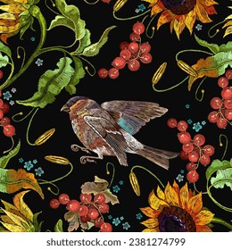 Sunflowers, bullfinch birds and red berries of mountain ash seamless pattern. Embroidery art. Fashion yellow summer flowers, template for clothes, tapestry, t-shirt design