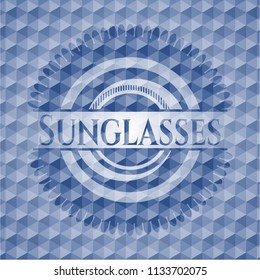 Sunglasses blue emblem with geometric pattern.