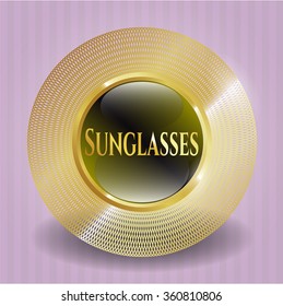 Sunglasses golden emblem or badge