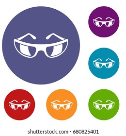 Sunglasses icons set in flat circle red, blue and green color for web