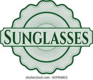 Sunglasses inside money style emblem or rosette