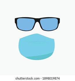 sunglasses next to mask on white backgroud