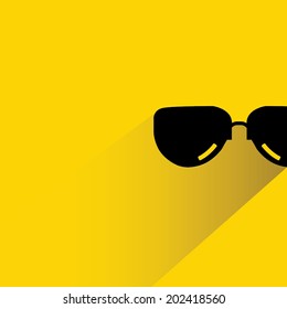 sunglasses on yellow background, shadow and flat theme