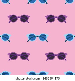 Sunglasses pattern on pink background. Minimal summer concept