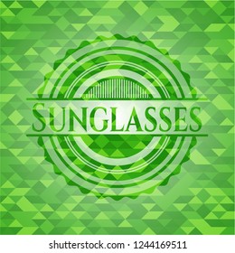 Sunglasses realistic green emblem. Mosaic background