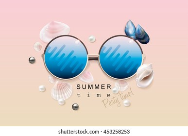 Sunglasses with vivid blue glass mirrors laying on a sandy beach surrounded by beautiful exotic seashells in top view perspective, summer concept