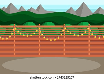 Sunny back yard with fence decorated with garland. Place for hanging out and hosting events