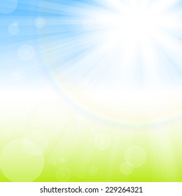 Sunny background with rays of light on blue and green background