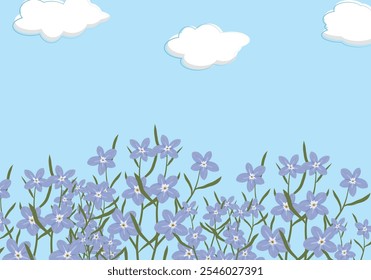 Sunny day with blue sky and blue flowers and green leaves 