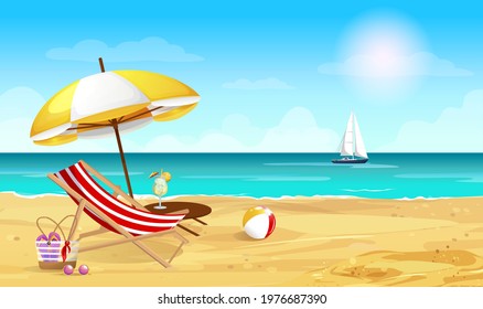 Sunny sandy beach with a sun lounger, umbrella, beach bag and a cocktail table on the shore of the azure sea with a yacht in the background. 