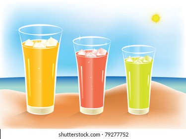 Sunny summertime beach with three glasses of icy juice on the sand. Juice time!