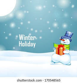 Sunny winter holiday and snowman with gift on snow background