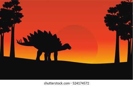 At sunrise dinosaur stegosaurus scenery