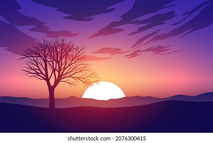 Sunrise or sundown landscape with lone tree silhouette