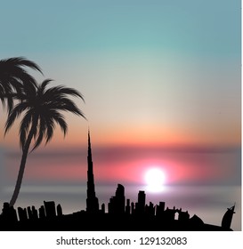 	Sunset background with Dubai skyline